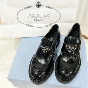 Women's Prada Black Patent Triangular Logo Platform Loafers (Size 37)